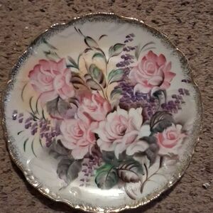 Ceramic decorative plate with hand-painted pink roses and purple flowers by Ucag